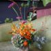 blooming-woodland-arrangement-with-mokara-orchid-and-zinnia-85